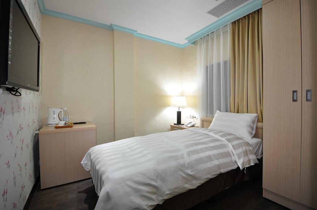 A casa Hotel Taoyuan Habitación foto