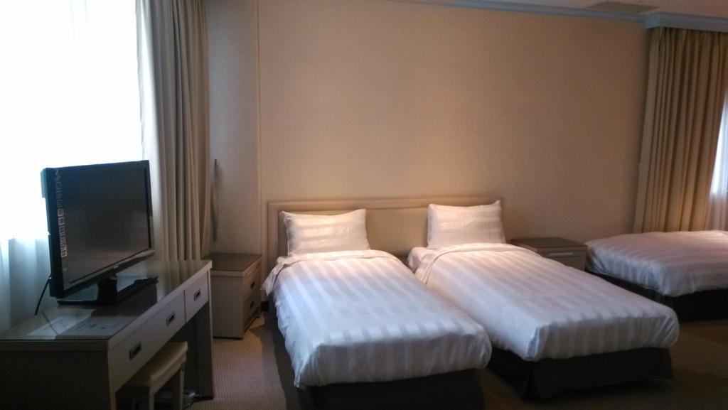 A casa Hotel Taoyuan Habitación foto