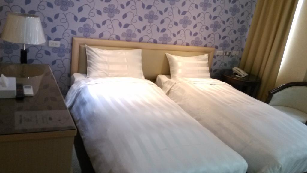 A casa Hotel Taoyuan Habitación foto