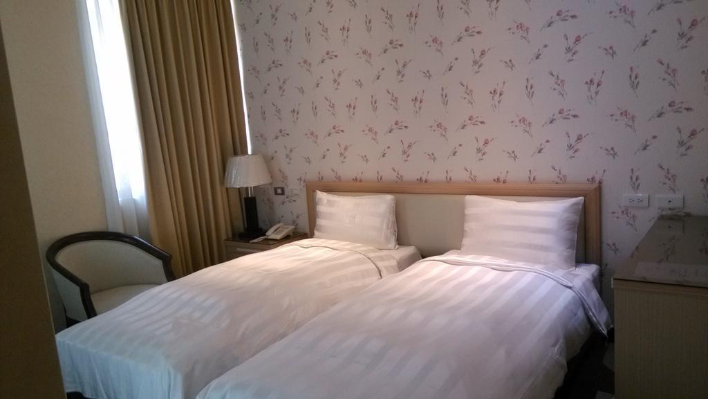 A casa Hotel Taoyuan Habitación foto