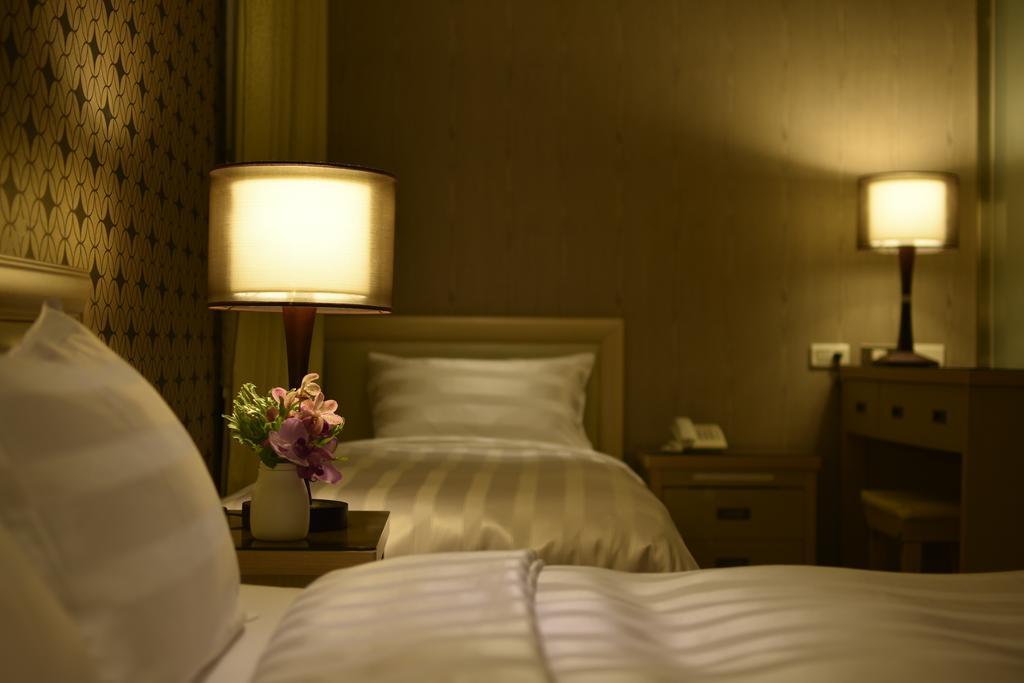 A casa Hotel Taoyuan Habitación foto