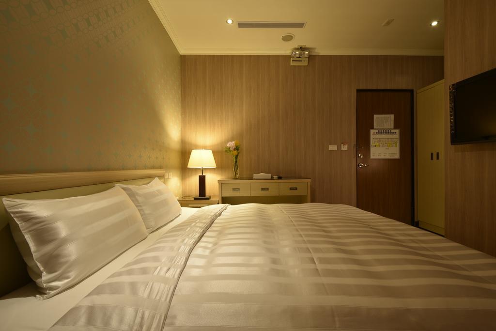 A casa Hotel Taoyuan Habitación foto
