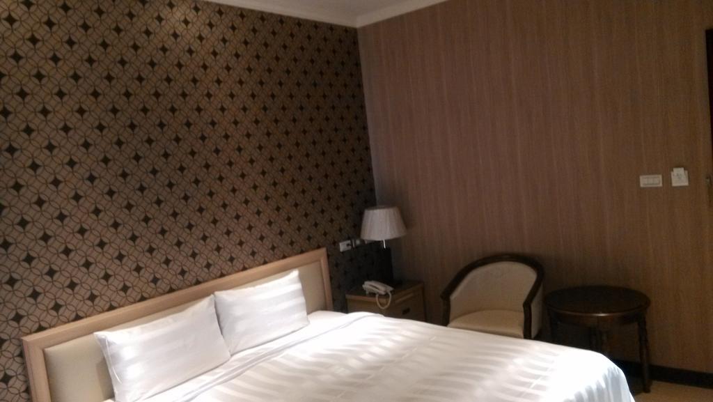 A casa Hotel Taoyuan Habitación foto