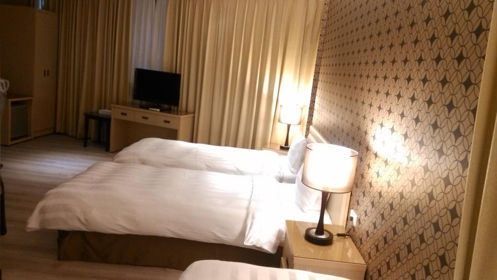 A casa Hotel Taoyuan Habitación foto