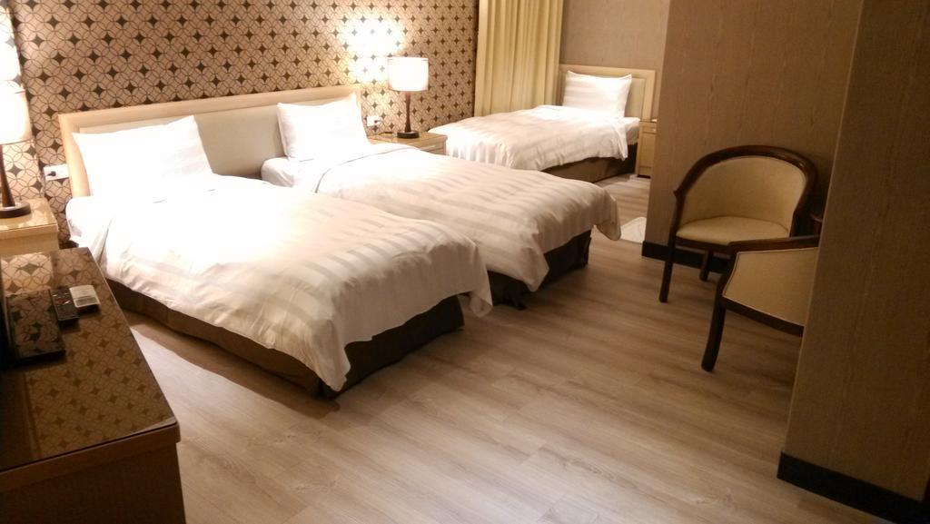 A casa Hotel Taoyuan Habitación foto